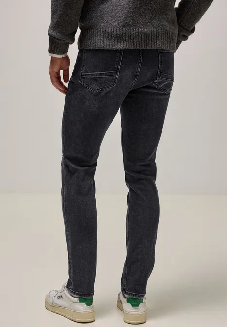 Jeans à la coupe slim black random wash