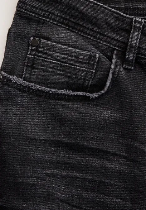 Jeans à la coupe slim black random wash