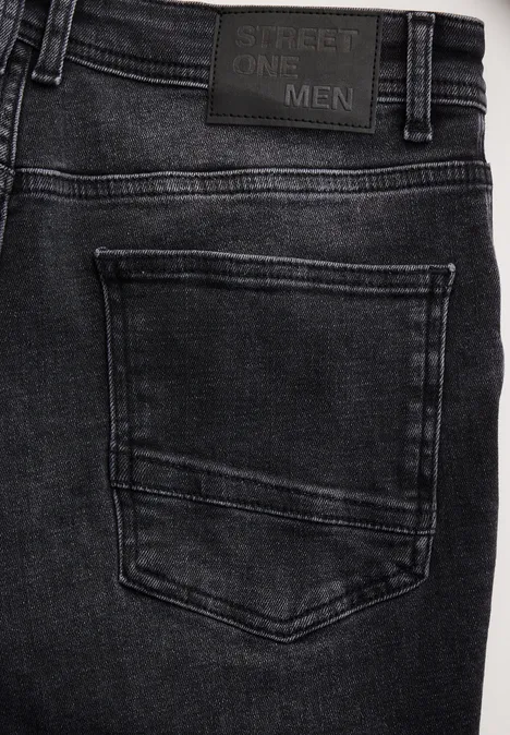 Jeans à la coupe slim black random wash