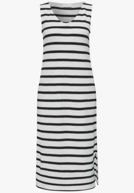 Ärmelloses, knielanges Kleid mit schwarzen und weißen Streifen, V-Ausschnitt und Seitenschlitz.