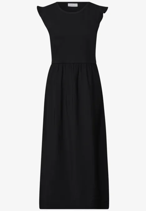 Robe midi noire légèrement évasée, taille marquée et épaules tombantes