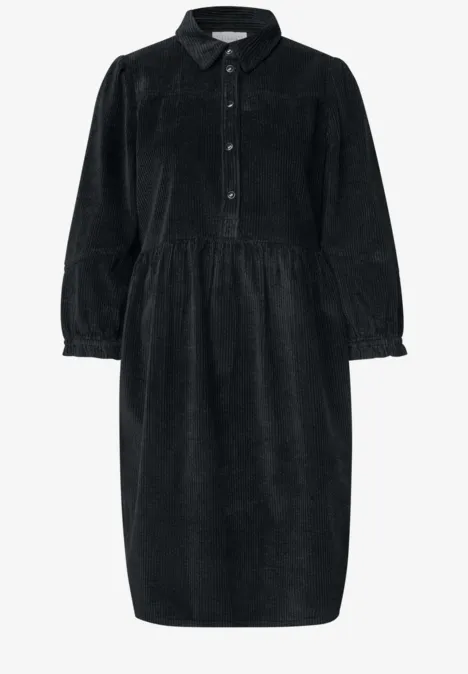 Kniehoge jurk van corduroy in effen kleur inked grey Zwarte midi ribfluwelen jurk met overhemdkraag, knoopsluiting, gerimpelde taille en lange mouwen.