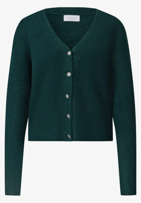 Cardigan mit V-Neck und Knopfleiste mossed green mel. Dunkelgrüne, kurz geschnittene Strickjacke mit V-Ausschnitt, langen Ärmeln und Knopfleiste.