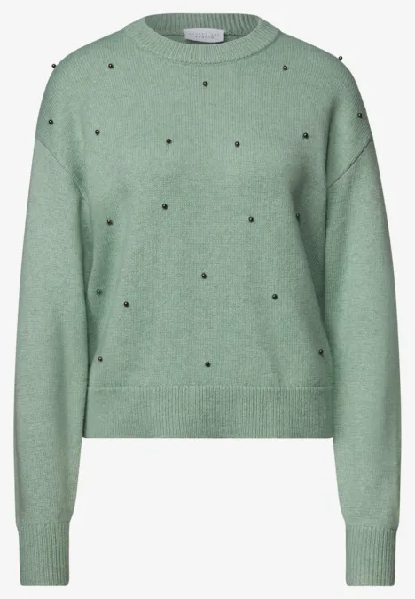 Trui met ronde hals en parelversieringen grayed mint mel. Lichtgroene trui met ronde hals, lange mouwen en kleine zwarte stippen, comfortabele losse pasvorm.