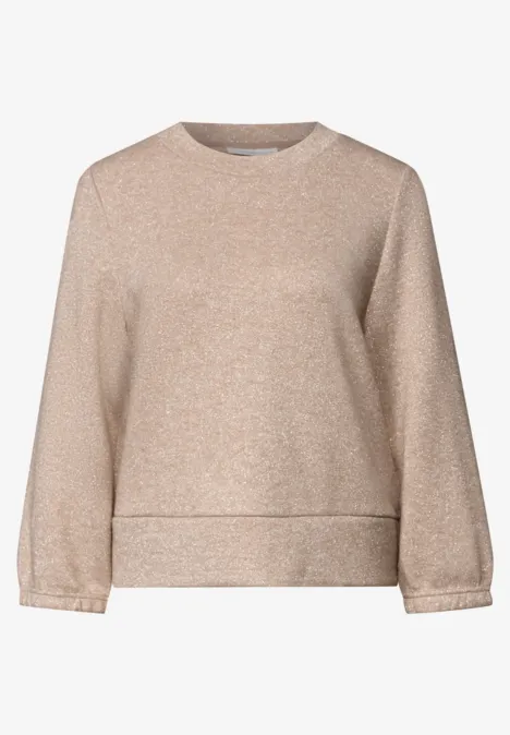 Beige Pullover mit Rundhalsausschnitt und leicht glänzender Oberfläche.