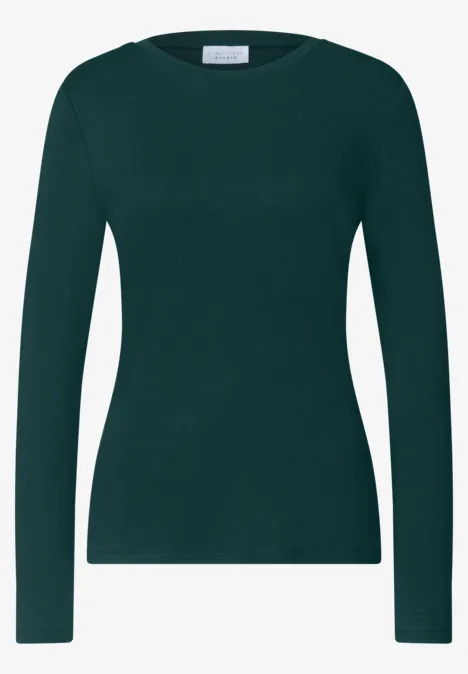 T-shirt basique uni à col rond mossed green Pull ajusté à manches longues couleur vert foncé avec encolure ronde.