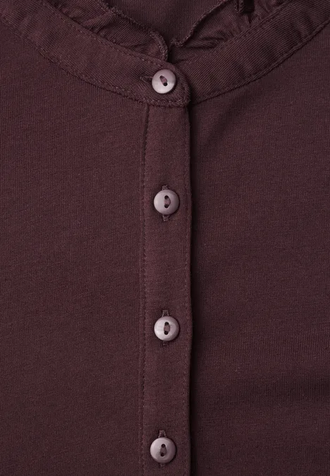 Langarm Shirt mit Rundhals und Rüschen russet red Bordeauxfarbener Cardigan mit Rüschenkragen und vier runden Knöpfen.