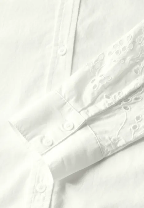 Bluse mit bestickten Ärmeln off white