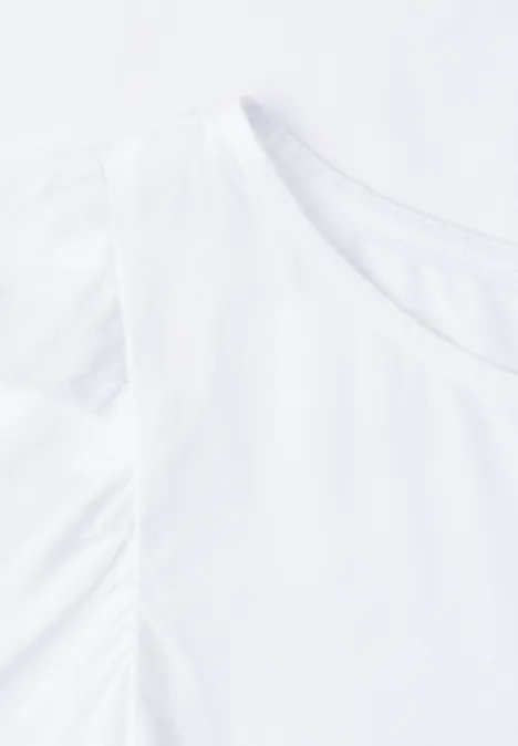 Dropped Shoulder Blusenshirt mit Rundhals White Nahaufnahme eines weißen T-Shirts mit Rundhalsausschnitt.