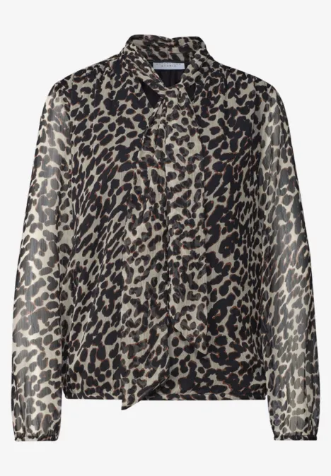 Chemisier léger à manches longues pour femme, motif léopard tendance, col chemise et patte de boutonnage.