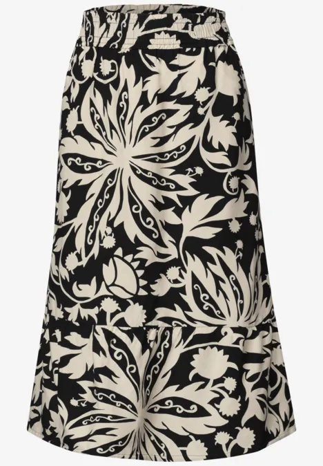 Midi-Rock mit Volants und Print Black Schwarzer Midirock mit weißem Blumenmuster und ausgestelltem Saum