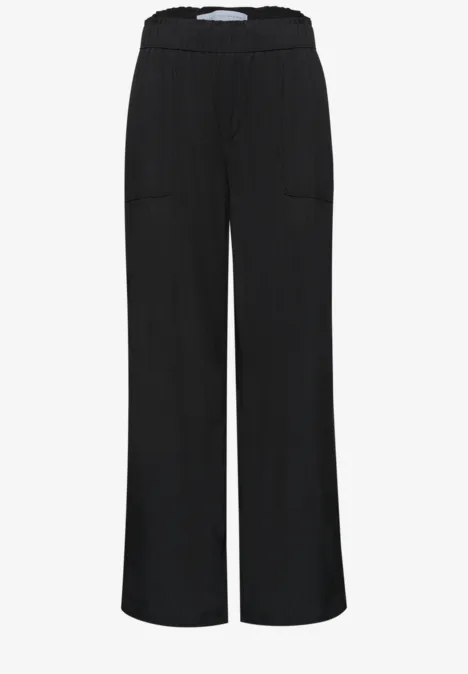 Pantalon noir ample avec taille élastique et poches plaquées