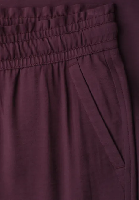 Paarse broek met elastische taille en zijzak