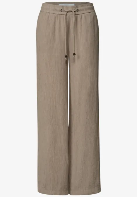 Straight Leg Hose mit Crinkle Struktur dark stone sand Helle beige Leinenhose mit weitem Schnitt und Kordelzugbund.