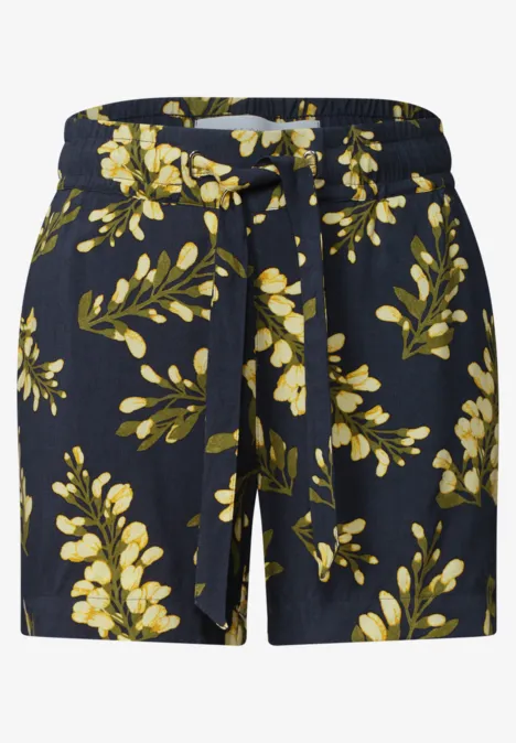 Short bleu foncé à motifs floraux jaunes et cordon de serrage