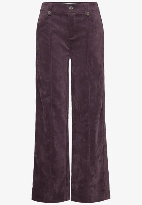 Pantalon taille haute en velours côtelé bordeaux, coupe large.