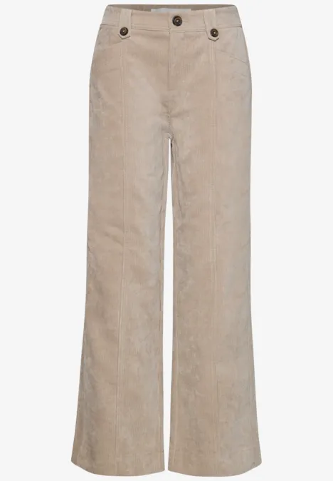 Pantalon en velours côtelé beige, coupe évasée et boutons à la taille.