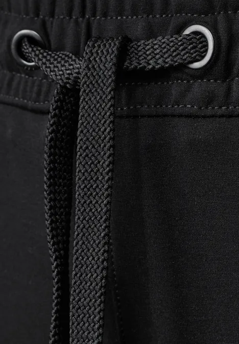 Mid Waist Broek met Wide Leg pijpen in casual pasvorm Black Close-up van een zwart koord met metalen oogjes op een kledingstuk.