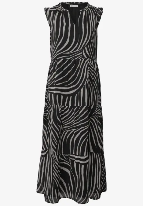 Robe longue sans manches motif zébré noir et blanc avec jupe fluide.