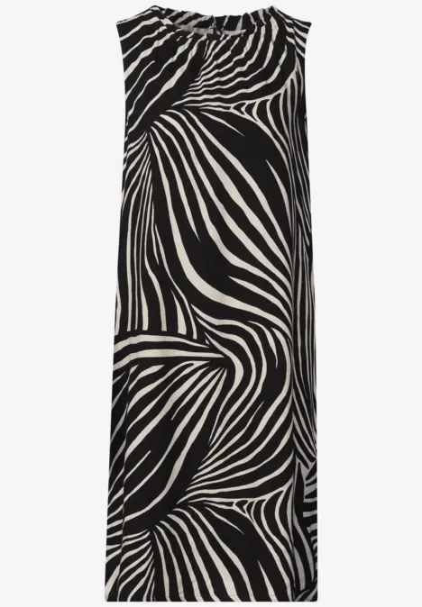 Robe mi-longue sans manches à motif zèbre abstrait noir et blanc.