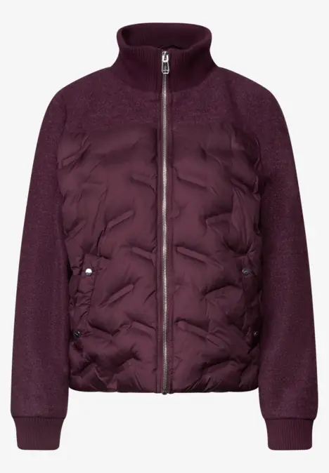 Veste femme violet foncé à devant matelassé, manches en maille et fermeture éclair