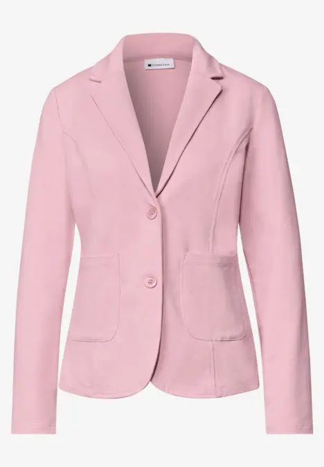 Veste blazer rose pâle pour femme avec col cranté, deux boutons et poches.