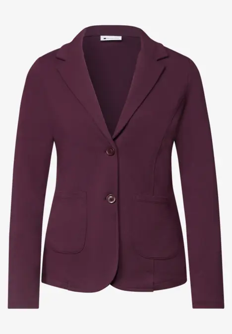 Damenblazer in dunklem Purpur mit zwei Knöpfen und aufgesetzten Taschen.