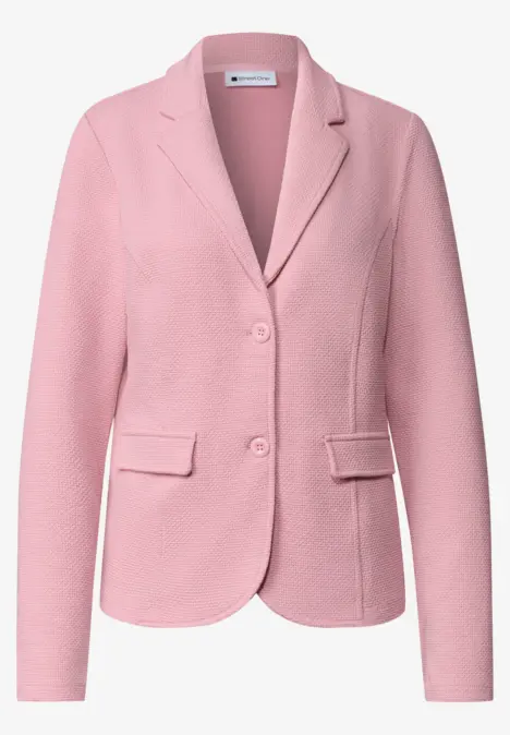Veste blazer rose avec col à revers, boutons et poches
