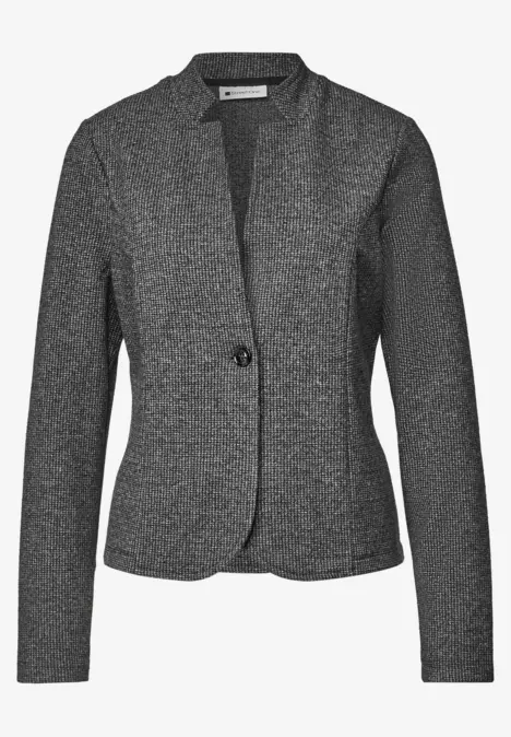 Ein taillierter, dunkelgrauer Blazer mit einem Knopfverschluss und klassischem Schnitt.