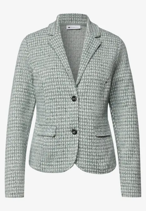 Leichter taillierter Damenblazer aus grün-weißem Tweed mit Reverskragen und zwei Knöpfen.