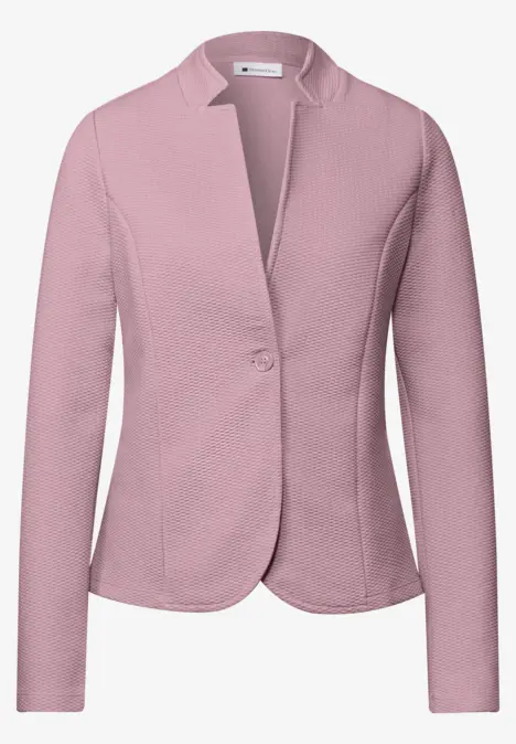 Hellrosa Blazerjacke für Damen mit langem Arm und Knopfverschluss.