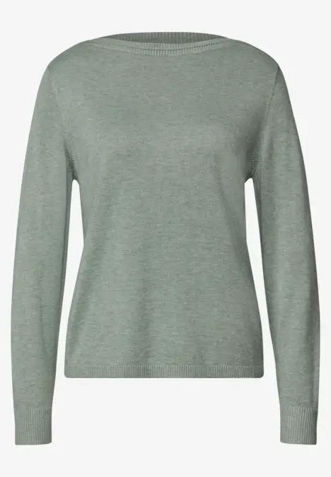 Un pull femme uni vert clair à col rond et manches longues.
