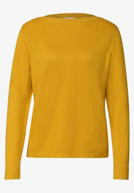 Pull jaune uni à col rond et manches longues.