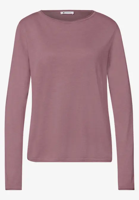 T-shirt à manches longues rose avec encolure ronde, coupe simple et élégante.