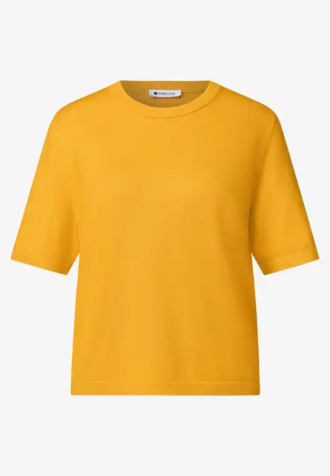 T-shirt jaune uni à manches courtes et col rond, coupe légèrement boxy.