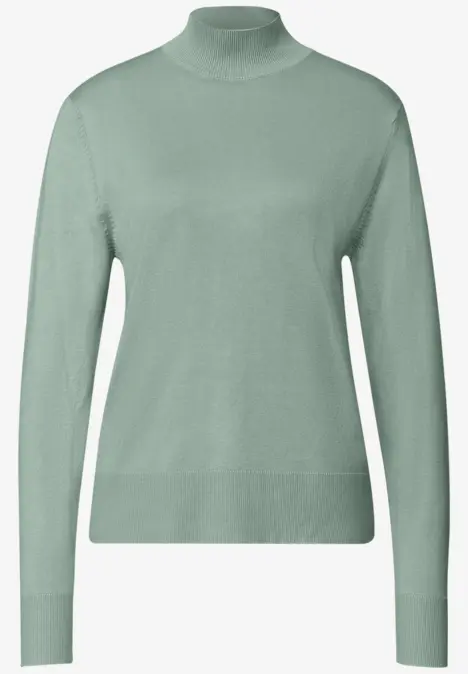 Hellgrüner Rollkragenpullover mit langen Ärmeln und schmaler Passform.