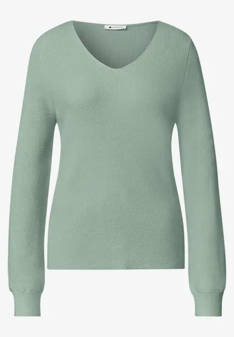 Hellgrüner Langarm-Pullover mit V-Ausschnitt für Damen.