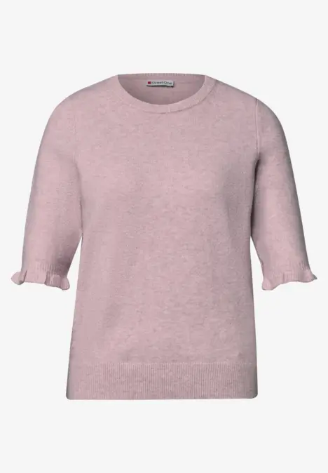 Pull fin manches courtes rose à col rond et délicats volants aux poignets.
