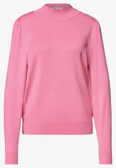 Rosa Damenpullover mit Rundhalsausschnitt und langen Ärmeln.