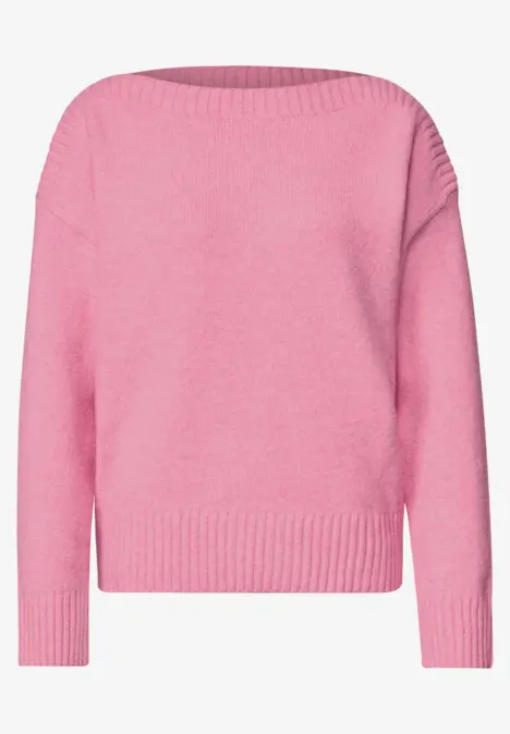 Ein pinker Langarm-Pullover aus Strick.