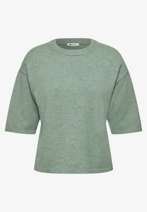 Hellgrünes, locker geschnittenes T-Shirt mit halblangen Ärmeln und Rundhalsausschnitt.