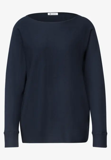 Dunkelblauer Pullover mit langen Ärmeln, schlichter Rundhalsausschnitt und gerippte Bündchen.