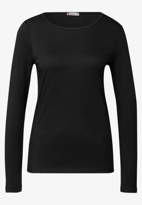 Schwarzes Langarmshirt für Damen, schlicht und körpernah geschnitten.