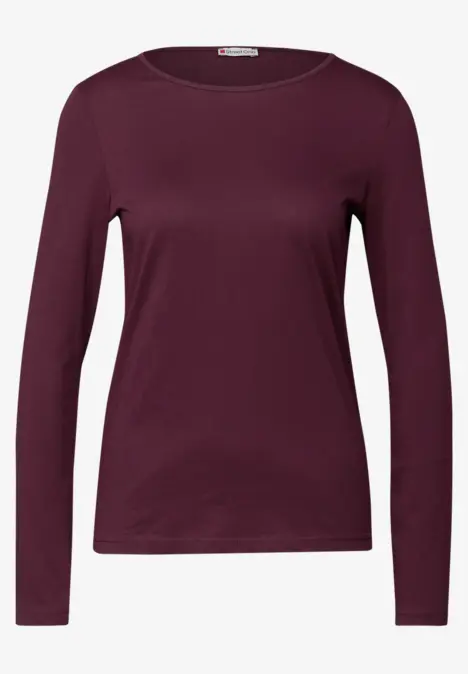 Bordeauxrotes Langarmshirt für Damen, schlicht und ohne Muster.