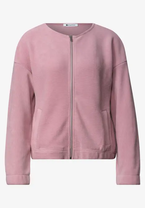 Veste polaire rose à fermeture éclair intégrale et poches latérales