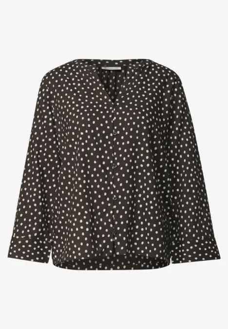 Schwarze Damenbluse mit V-Ausschnitt und weißem Herzmuster