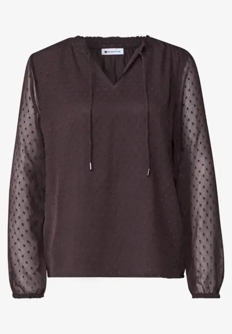 Dunkelbraune Bluse mit transparenten, gepunkteten Ärmeln und V-Ausschnitt mit Kordelzug.