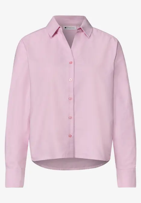 Chemise rose pâle à manches longues, col et boutons sur le devant