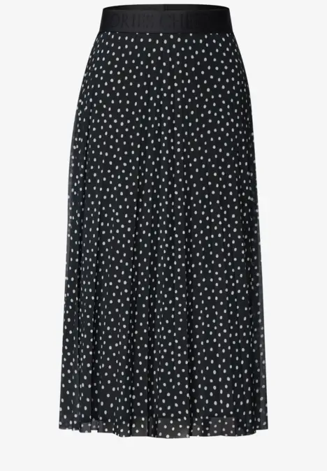 Schwarzer plissierter Midirock mit weißen Polka-Dots und elastischem Bund.