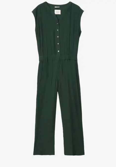 Dunkelgrüner ärmelloser Jumpsuit mit Knopfleiste vorne.